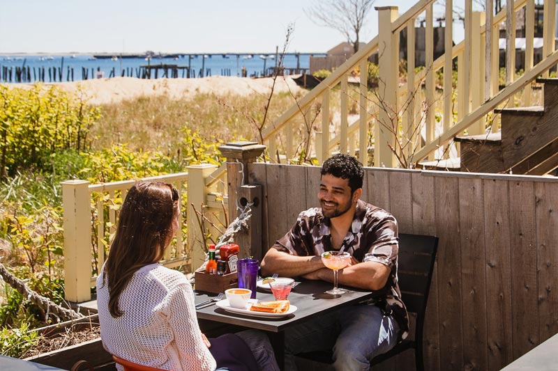 A couple dining on the beach
