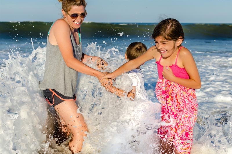 Children playing in the surf