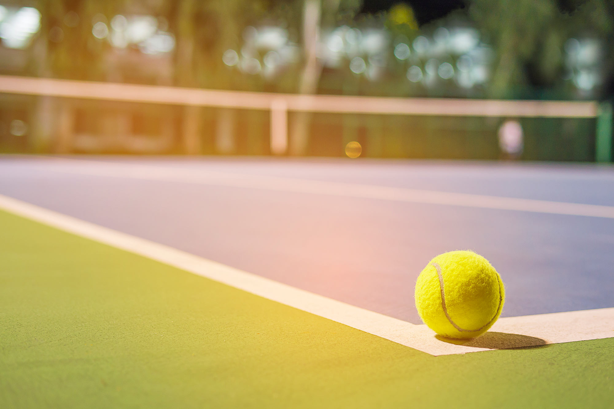 Tennis ball on a tennis court